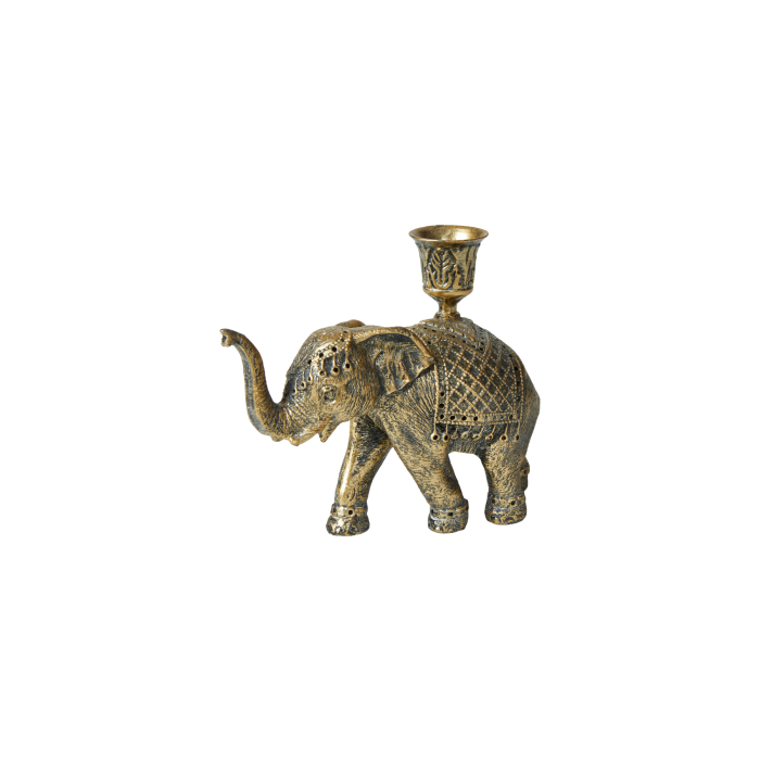 Guldfarvet elefant til lys