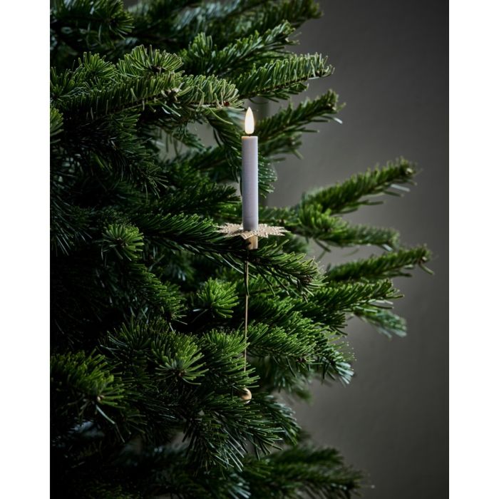 Hvidt LED-juletræslys i guldfarvet lysholder på juletræet