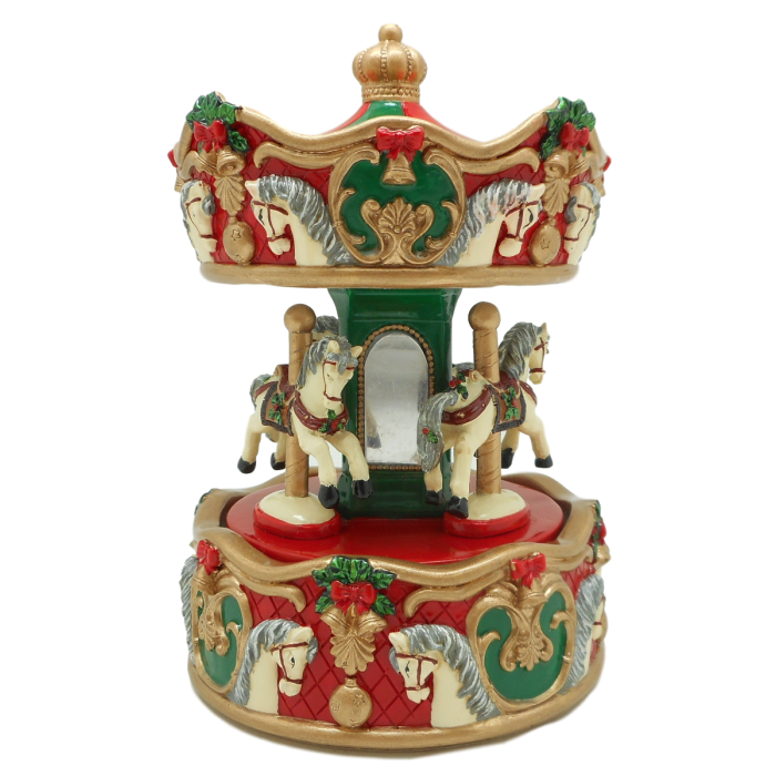 Julekarrusel med julepyntede heste kan trækkes op og derved dreje rundt og spille julemelodi fra Spilledåsernes Verden.