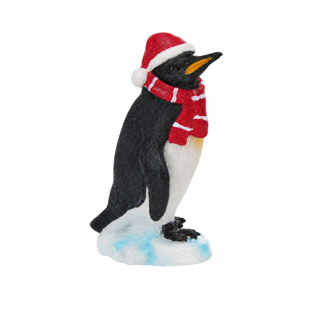 Pingvin med nissehue og halstørklæde
