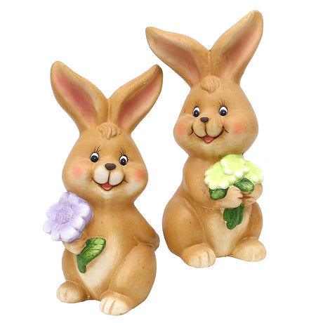 To påskeharer med påskeblomster