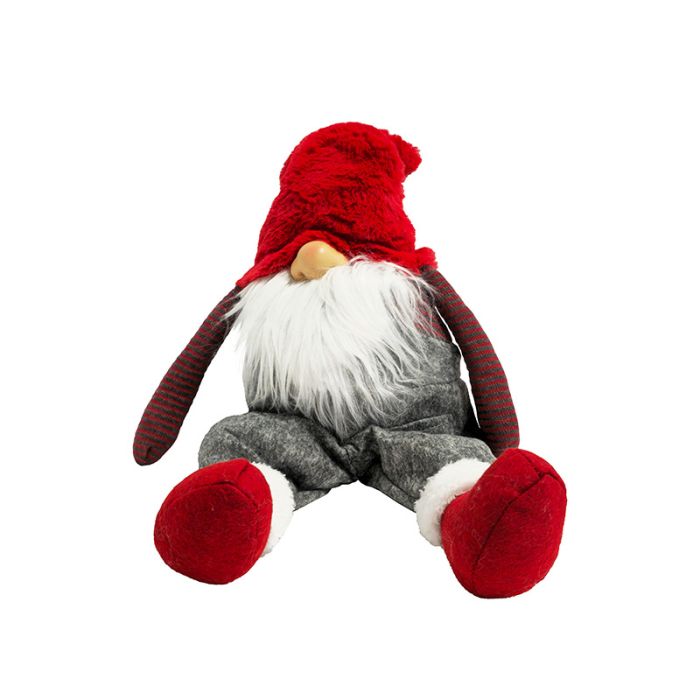 Gnom med rødt tøj siddende