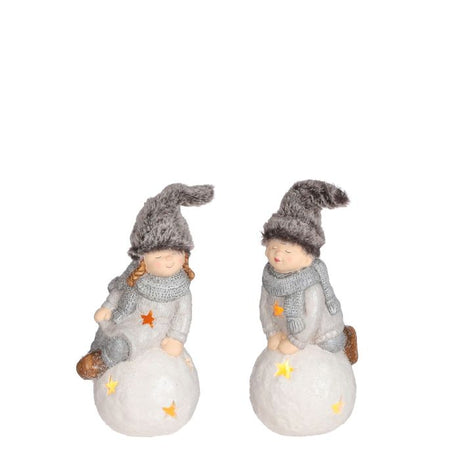 Vinterbørn på snebold med lys 