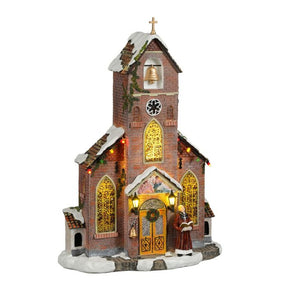 Luville Murstenskirke med præst