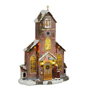 Luville Murstenskirke med præst