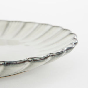 Nærbillede af kanten på Corfu tallerken i grå