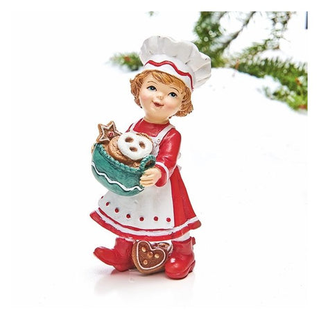 Pige med juletøj og kurv med småkager. Julefigur fra Pobra. 