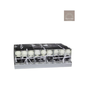 Julekugler i sorte, hvide og sølv/glas farver i glas. 