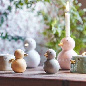 Fyrfadsstage and lysegul & gul