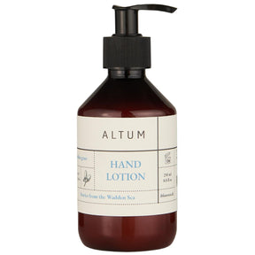 ALTUM Golden Grass håndlotion fra Ib Laursen i brun pumpeflaske med sort pumpe og cremefarvet etiket, 250 ml