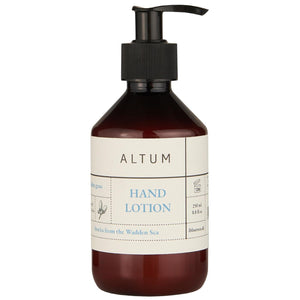 ALTUM Golden Grass håndlotion fra Ib Laursen i brun pumpeflaske med sort pumpe og cremefarvet etiket, 250 ml