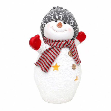 Glad snemand med lys