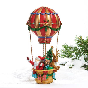 Julemand i luftballon med både, gaver, rensdyr og juletræ. Smukke julefarver og fine detaljer fra Pobra. 