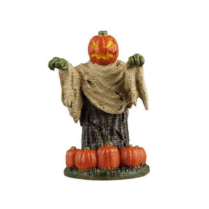 Halloween græskarhoved dekoration med fire græskar foran, et uhyggeligt design
