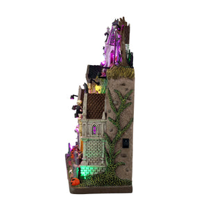 Crypt City facade bygning med lys til Halloween landskab fra Lemax set fra siden med grøn spot