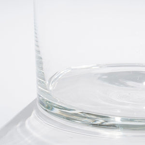 Bunden af cylinderglasvasen