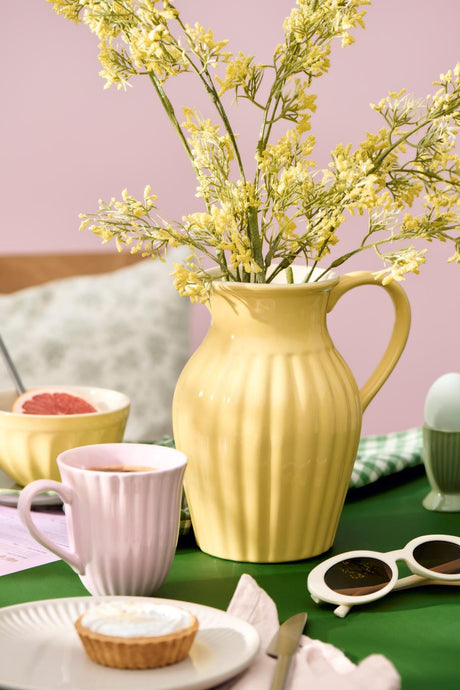 Kande Mynte lemonade gul med grene i