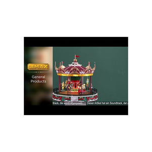  der kører rundt i karrusellen mens forældre ser på fra Lemax. 