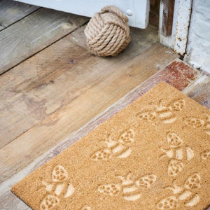 Dørmåtte med bimotiv – Kokosmåtte fra Ib Laursen på trægulv