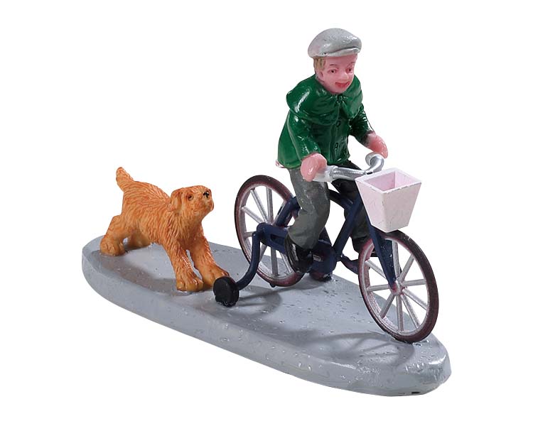 Billede af Dreng på cykel med hund