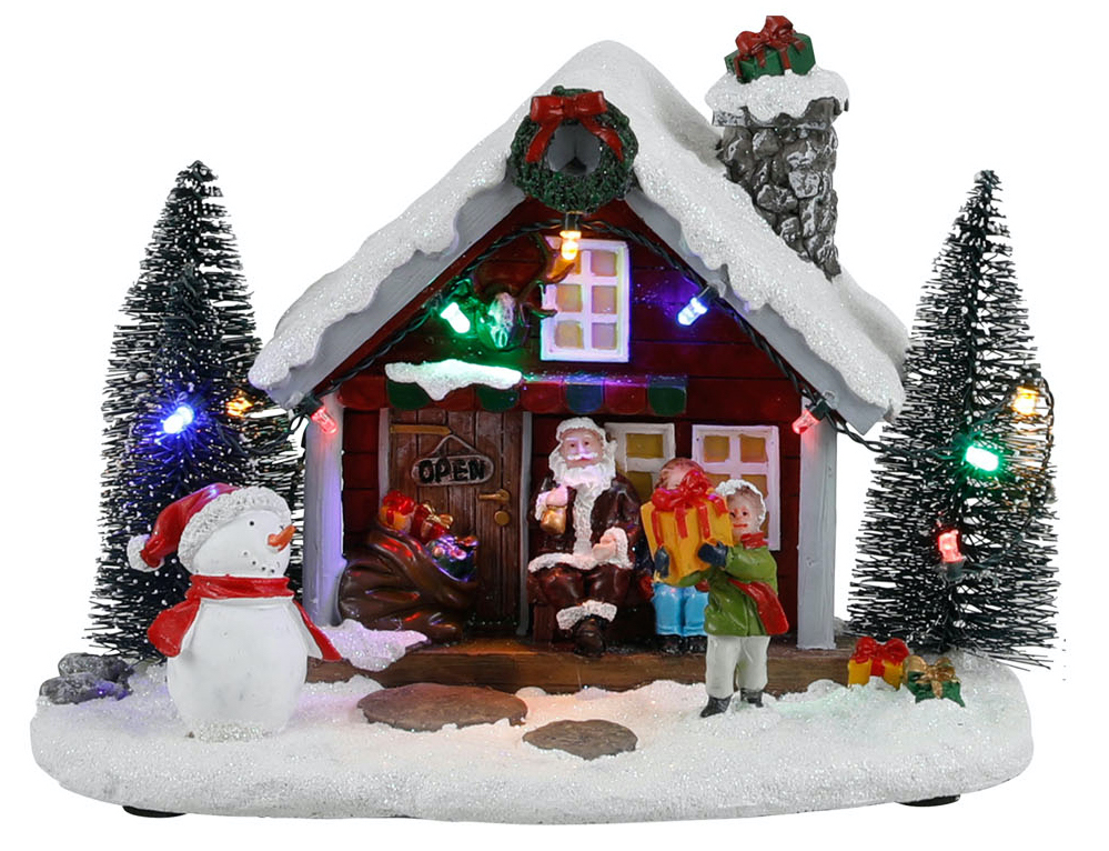 Billede af Julemands hjem med en lille dreng