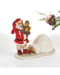 Julemand med slædehund og iglo