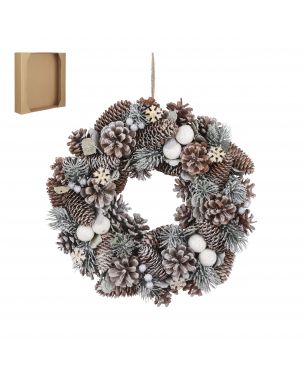 Christmas wreath with snow and fir cones