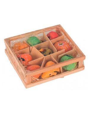 Small pumpkins in a wooden box