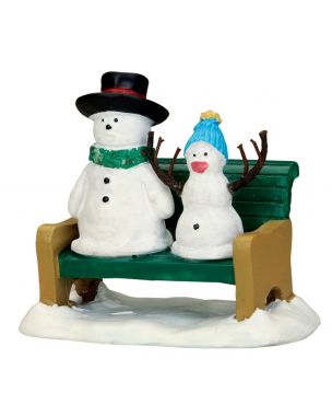 Snowmen on a bench